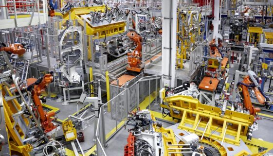 Robot arms in a car manufacturing factory