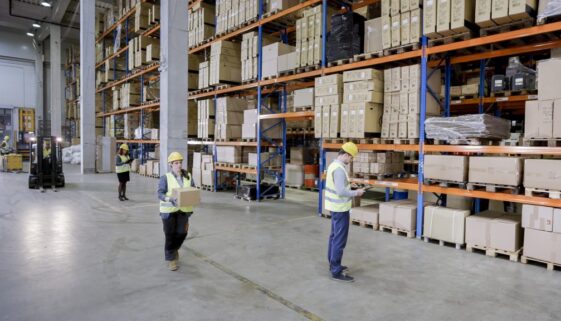 Manual workers working in warehouse
