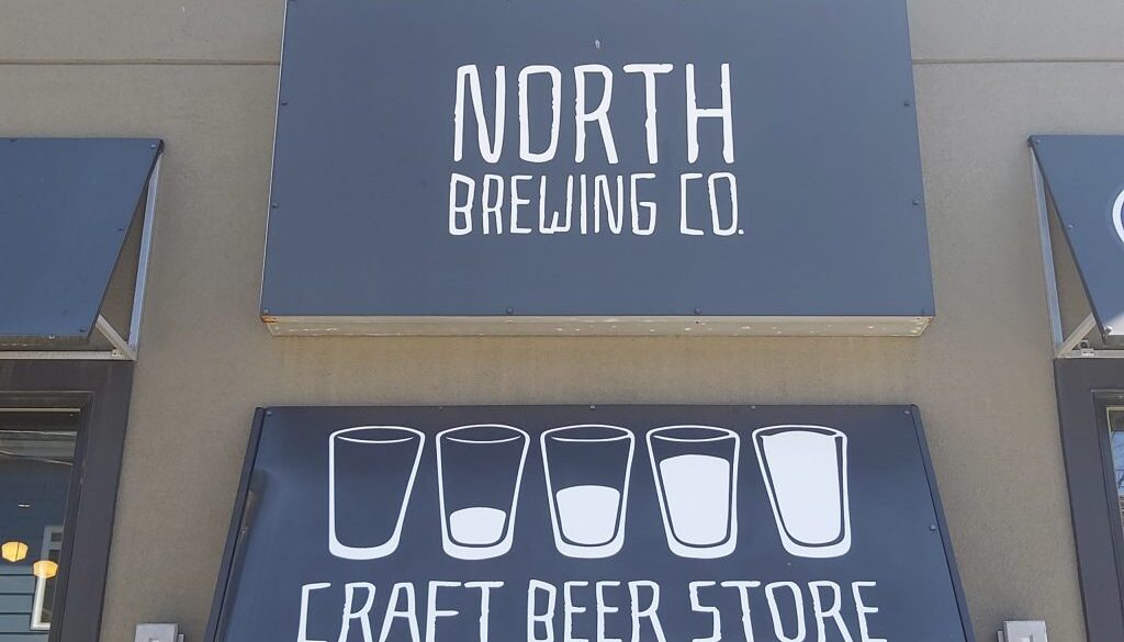 The North Brewing sign above the door of the brewery's Dartmouth location