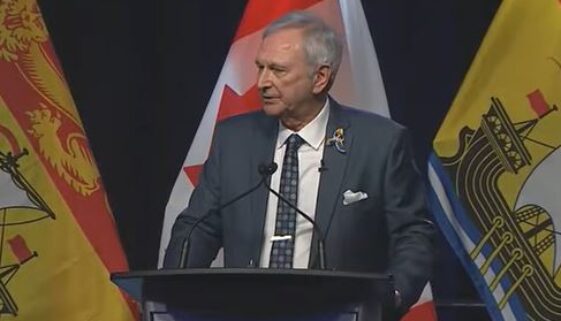 NB Premier Blaine Higgs gives his State of the Province address at the Fredericton Convention Centre, Thursday evening. (Image Courtesy Rogers TV New Brunswick, YouTube)